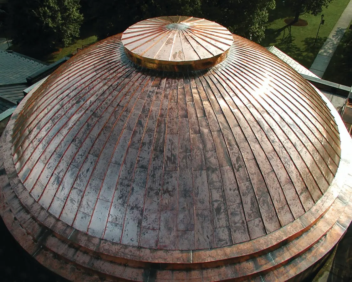 Craftsman Roofing crew installing a new roof in Glenwood Landing